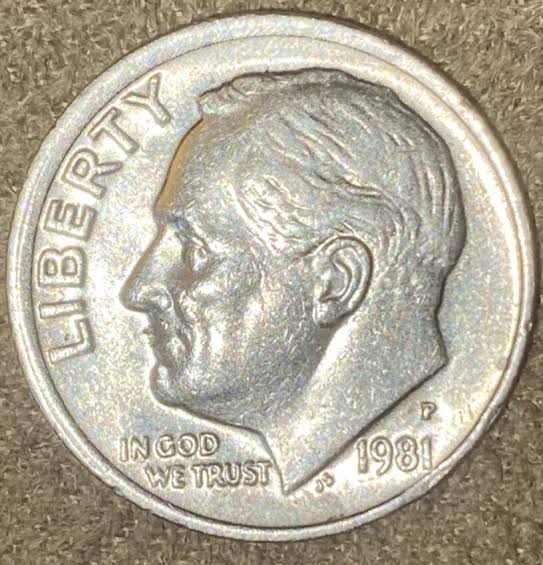 1981 Roosevelt dime off-center strike error showing shifted design and blank crescent area